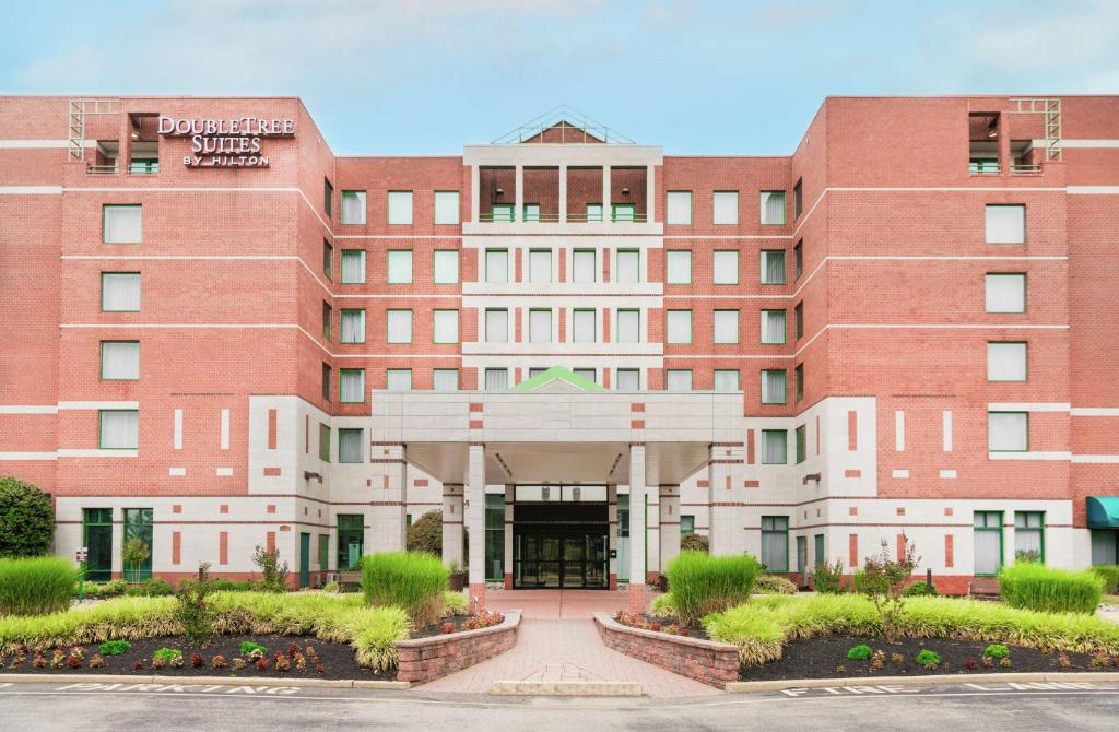 a rendering of the front of a building at DoubleTree Suites by Hilton Hotel Philadelphia West in Plymouth Meeting