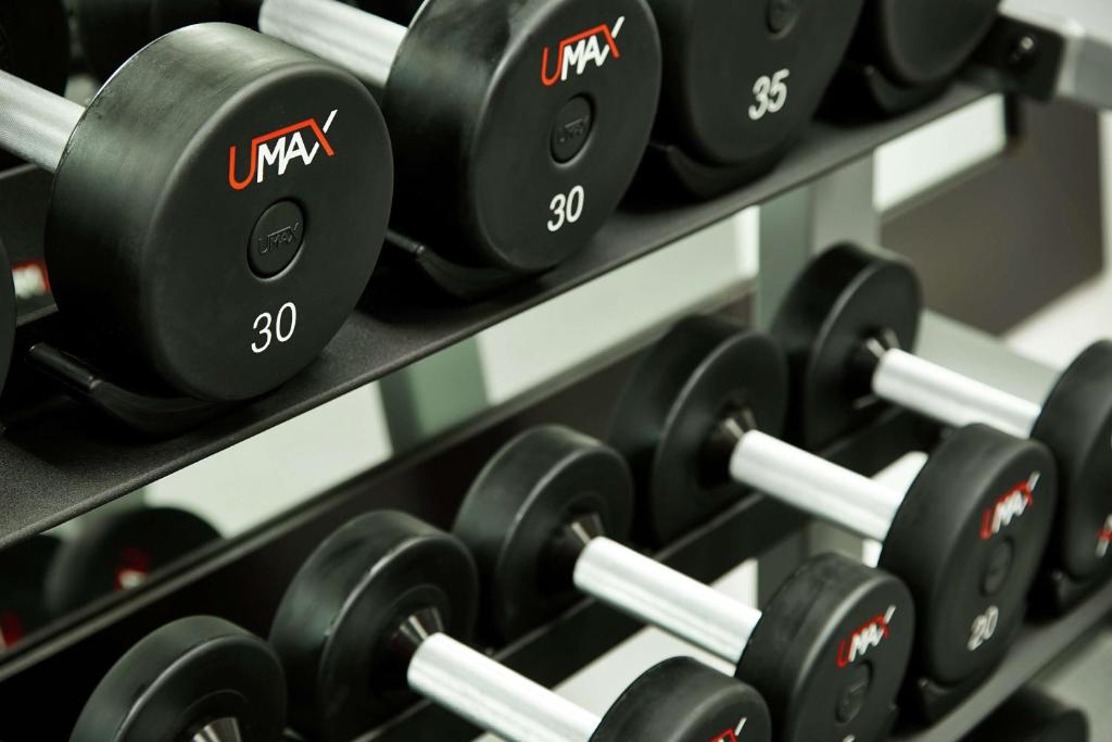 a row of dumbbells on display in a gym at Hilton Garden Inn Phoenix Downtown in Phoenix
