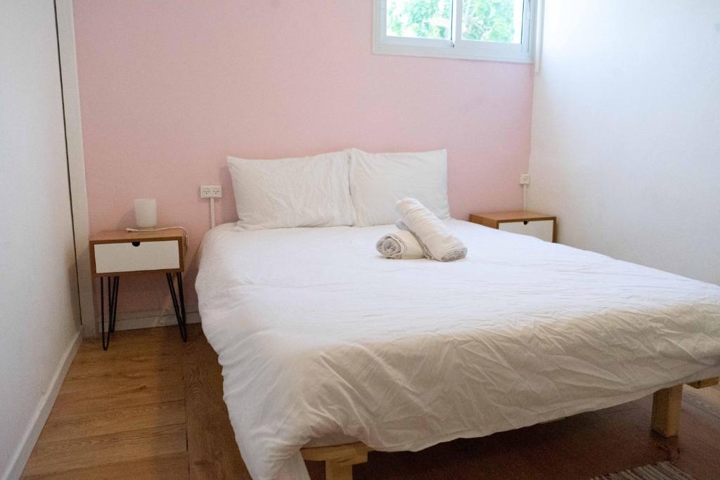 Letto o letti in una camera di Ajami Guest House