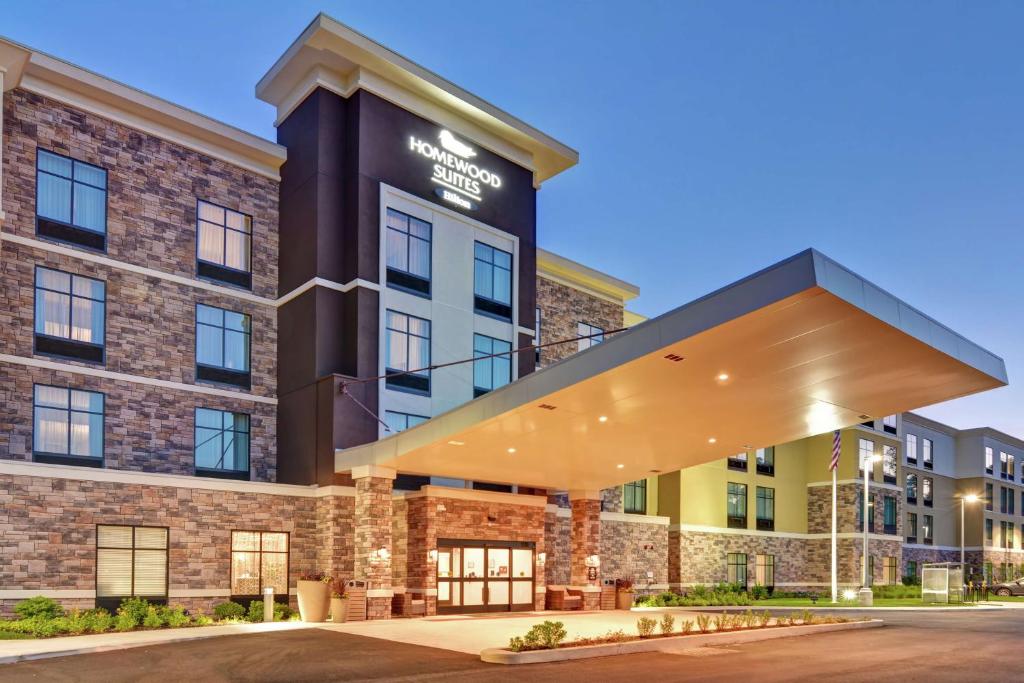 una representación del frente de un hotel en Homewood Suites By Hilton Poughkeepsie, en Poughkeepsie