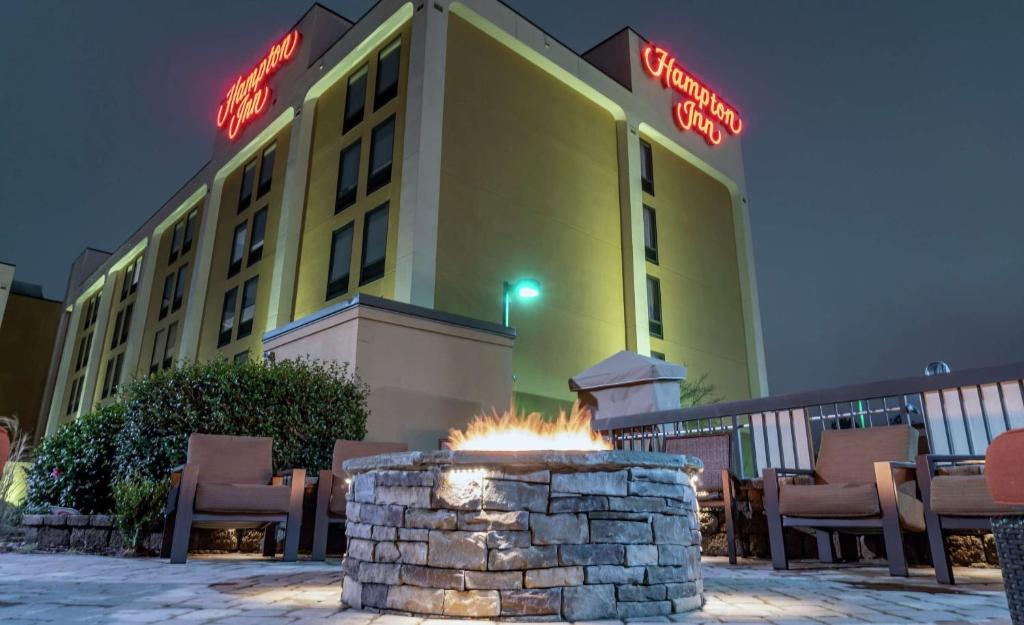 a fire pit in front of a hotel at night at Hampton Inn Rock Hill in Rock Hill