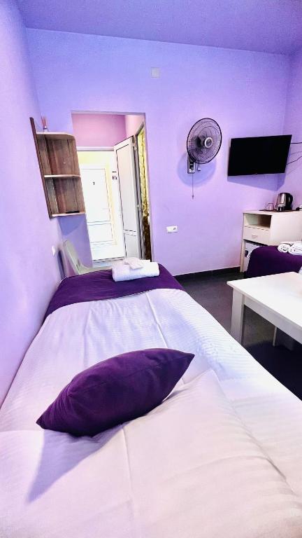 Postel nebo postele na pokoji v ubytování MarNar Hotel