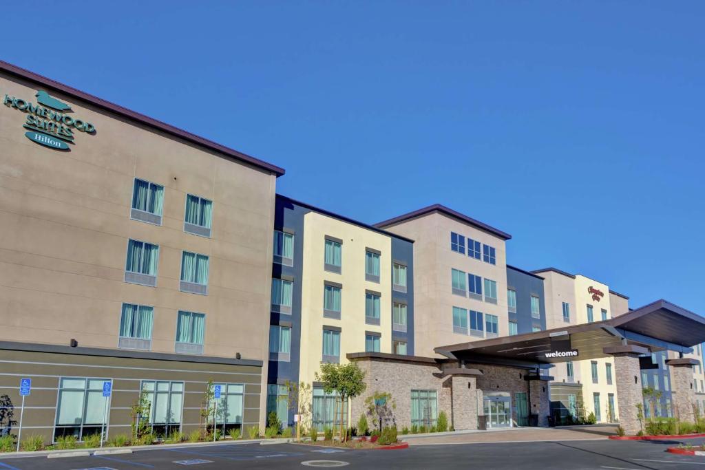 a rendering of a hotel with a parking lot at Homewood Suites By Hilton Chula Vista Eastlake in Chula Vista