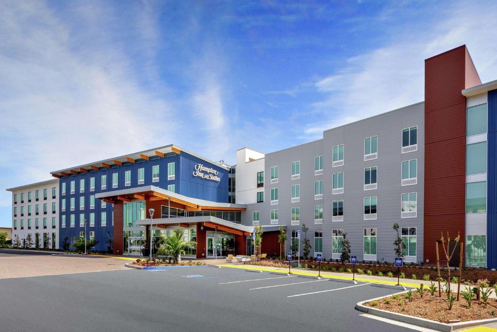 a rendering of a hotel with a parking lot at Hampton Inn & Suites San Diego Airport Liberty Station in San Diego