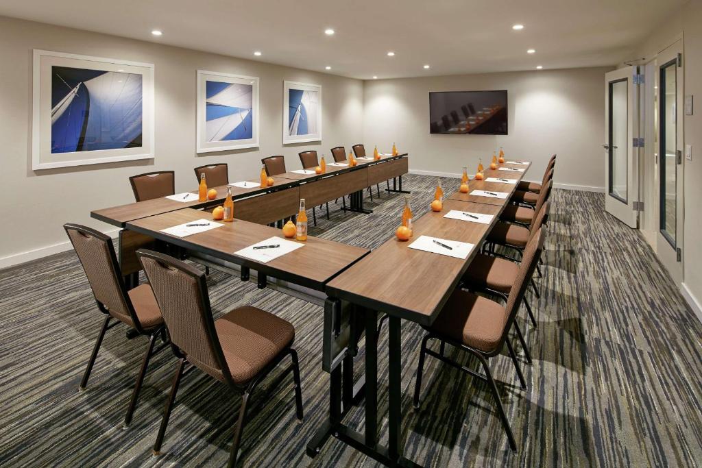 a large conference room with a long table and chairs at Hilton Garden Inn San Diego Mission Valley/Stadium in San Diego