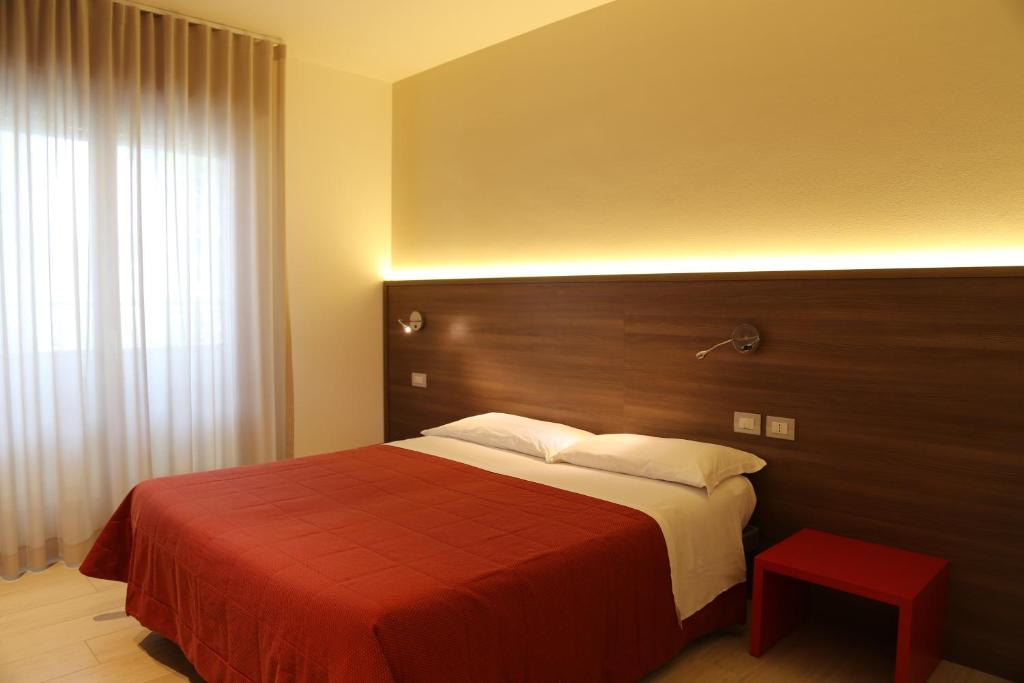 Кровать или кровати в номере Villaggio Mare Blu
