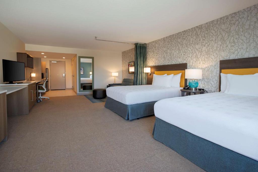 Postel nebo postele na pokoji v ubytování Home2 Suites By Hilton Lewes Rehoboth Beach