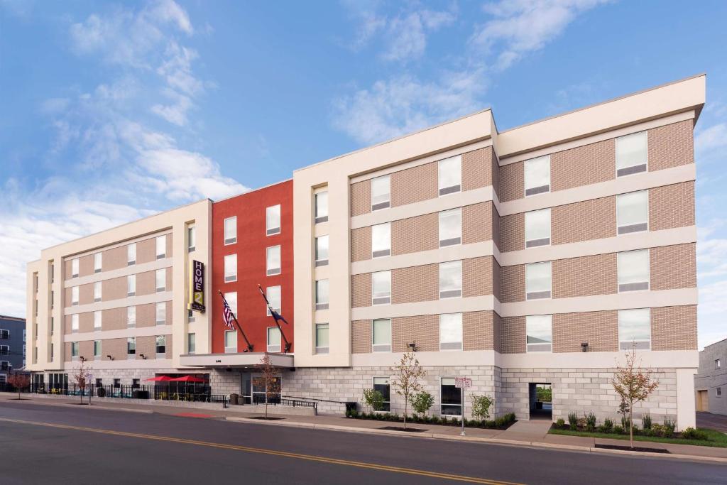 a rendering of the front of a building at Home2 Suites by Hilton Louisville Downtown NuLu in Louisville