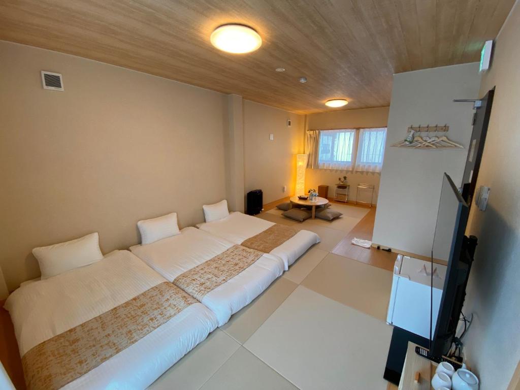 Postel nebo postele na pokoji v ubytování AJITO Hostel & CafeBar