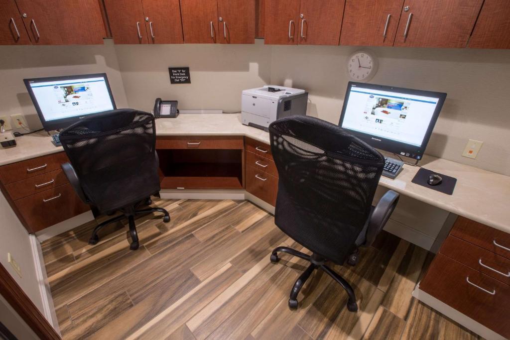 an office with two desks with two computers and a printer at Hampton Inn & Suites Berkshires-Lenox in Lenox