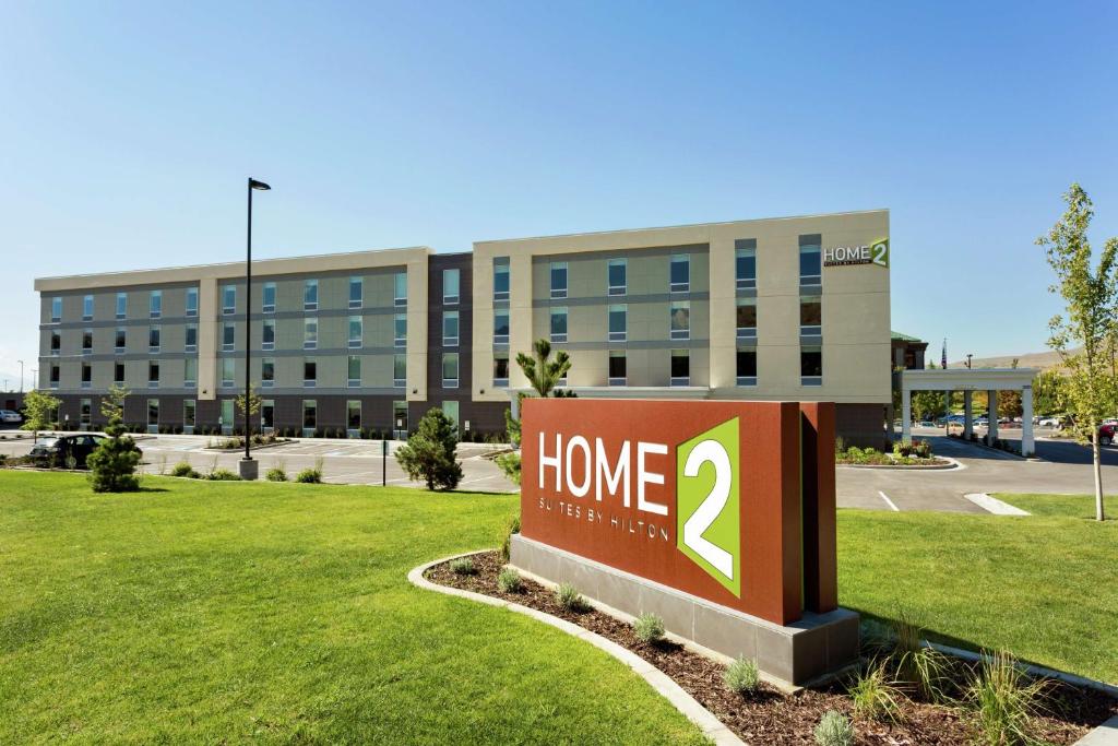a home sign in front of a building at Home2 Suites by Hilton Lehi/Thanksgiving Point in Lehi