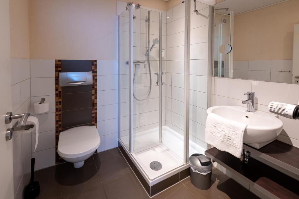 Koupelna v ubytování Flair Hotel Hopfengarten