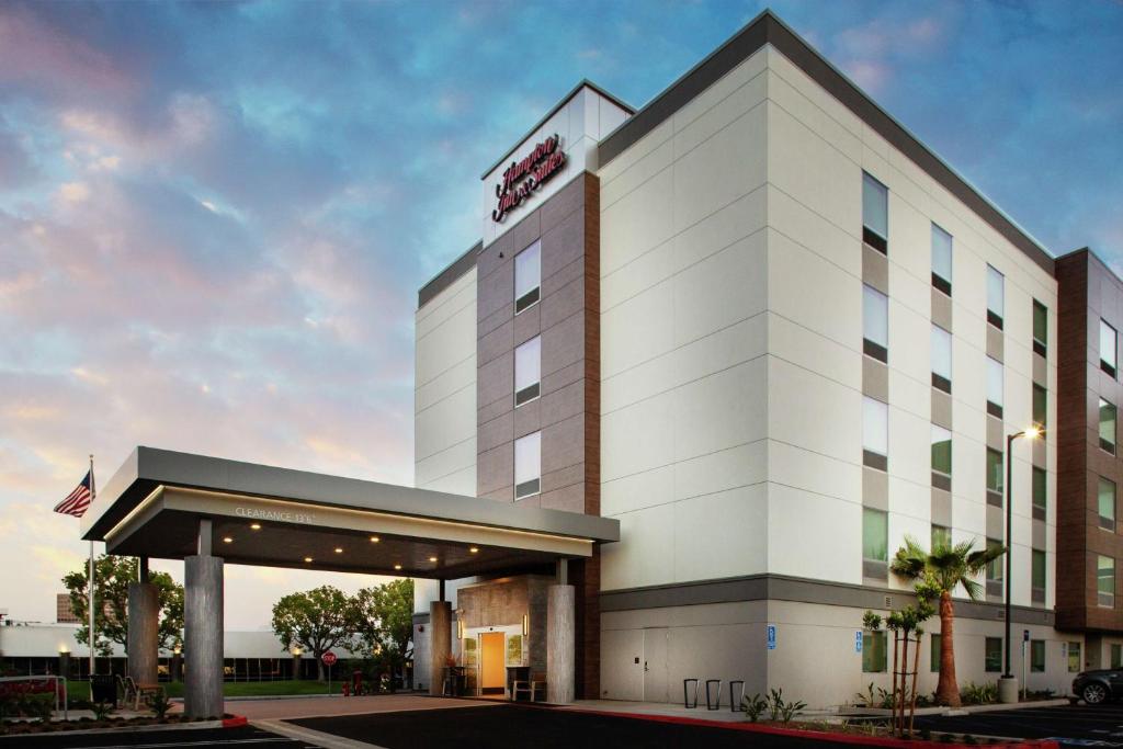 a rendering of the front of a hotel at Hampton Inn & Suites Irvine/Orange County Airport in Irvine