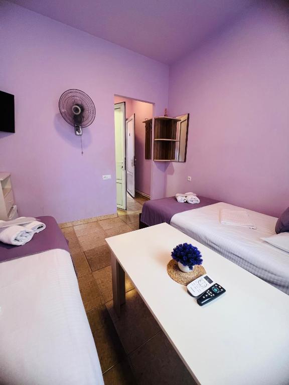 Postel nebo postele na pokoji v ubytování MarNar Hotel