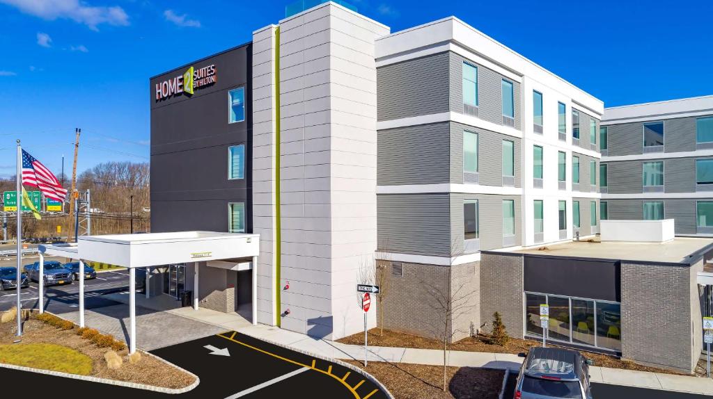 a rendering of the front of a building at Home2 Suites By Hilton Wayne, NJ in Wayne