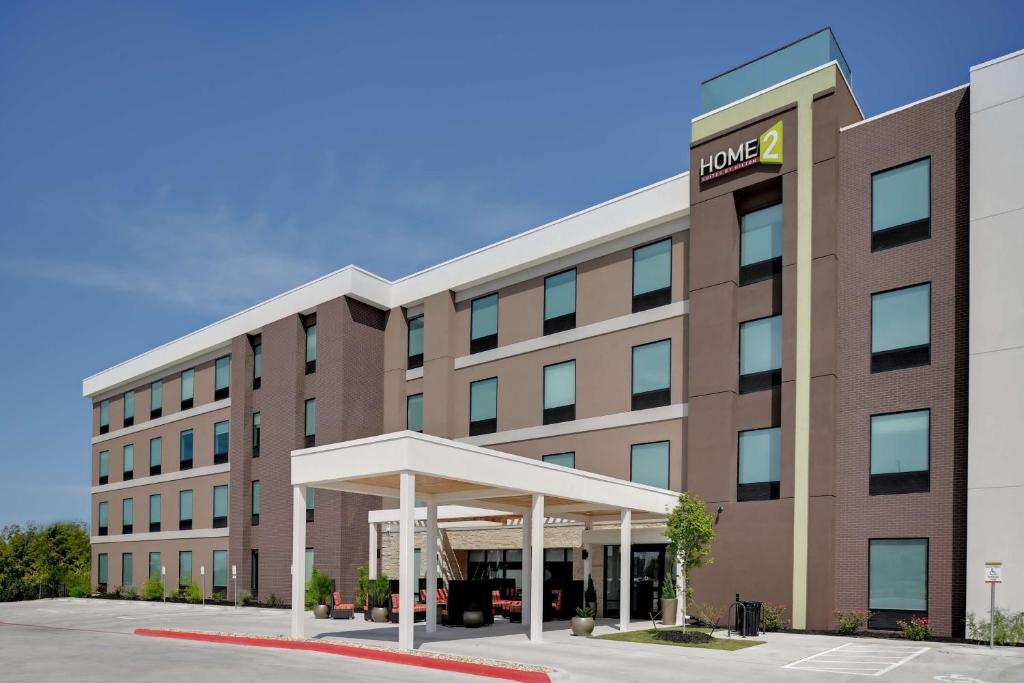 a rendering of the front of a hotel at Home2 Suites By Hilton Temple in Temple