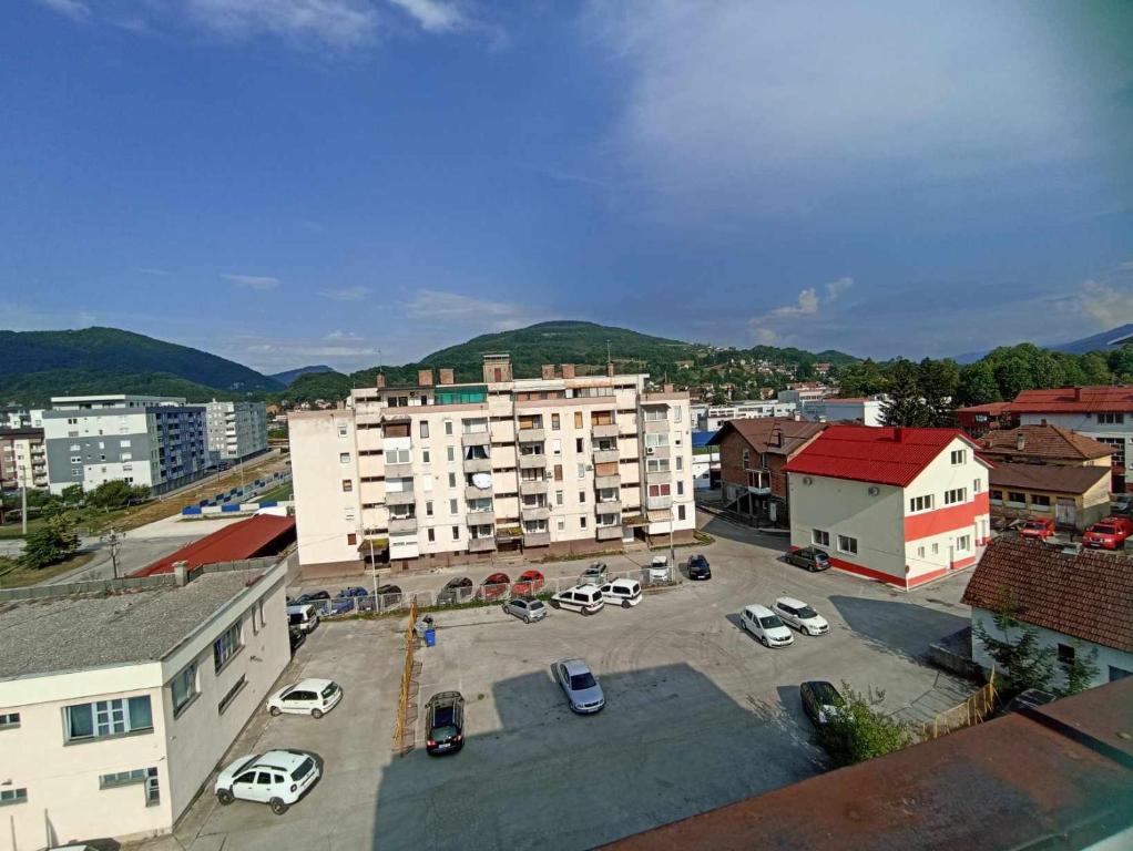 an aerial view of a city with a parking lot at Apartments Emir in Kiseljak
