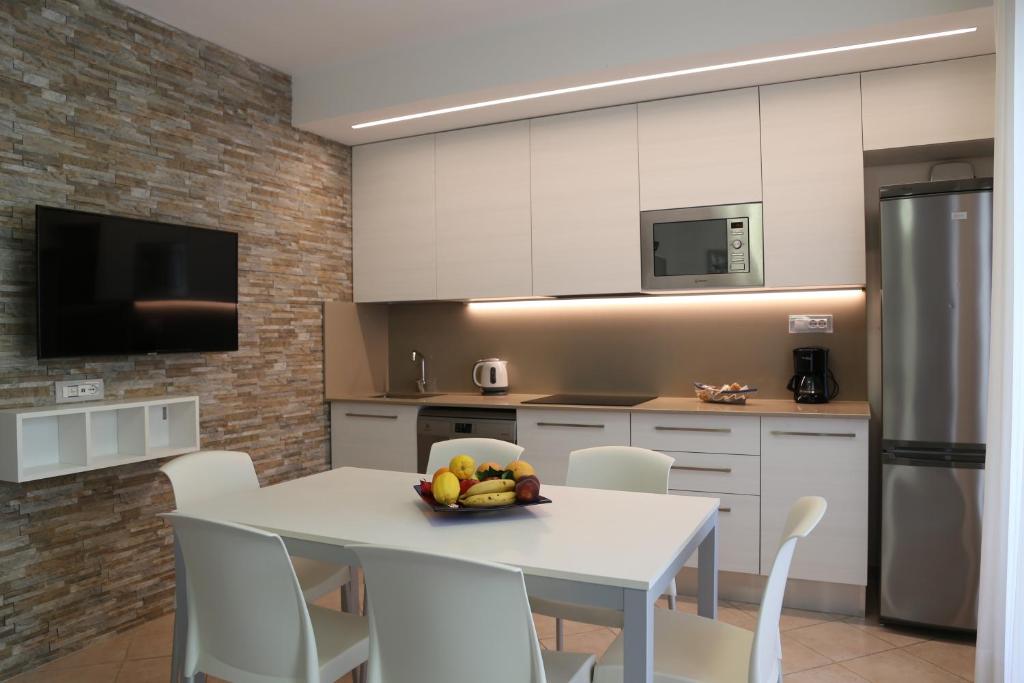 Кухня или мини-кухня в Villaggio Mare Blu
