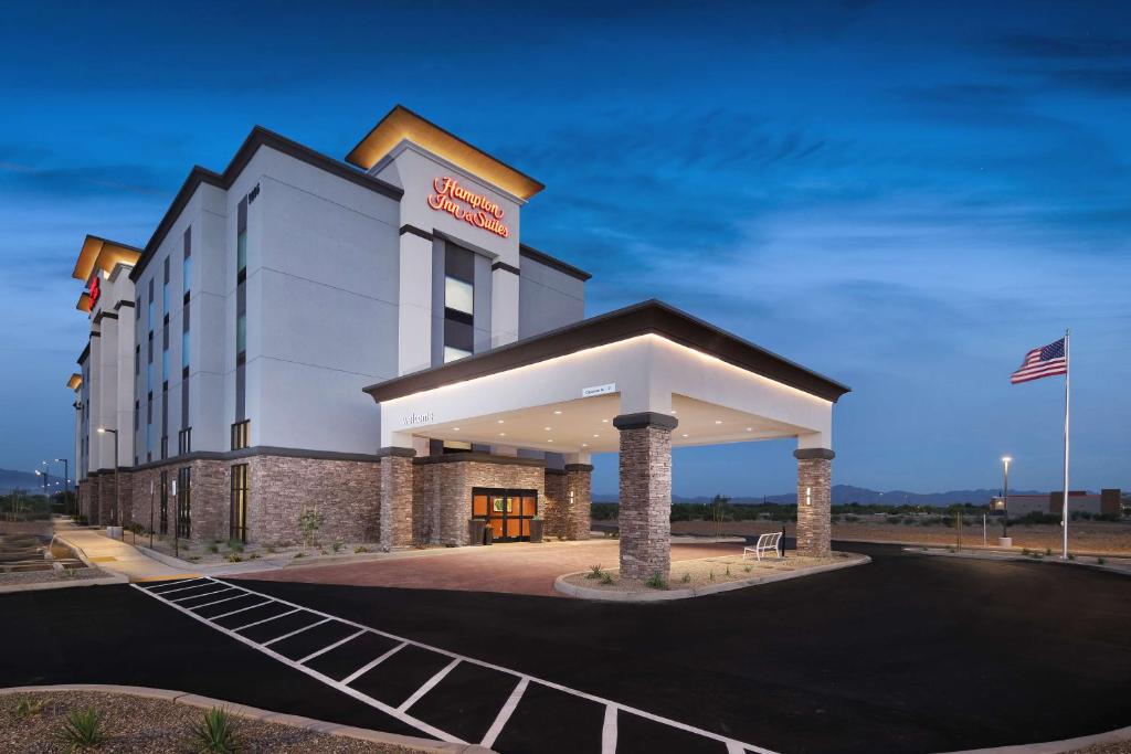 a hotel with a sign on the front of it at Hampton Inn Suites Tucson Tech Park in Tucson