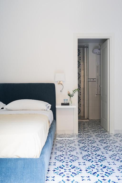 Postel nebo postele na pokoji v ubytování Residenza Amalphia