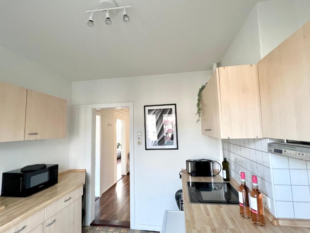 Kuchyň nebo kuchyňský kout v ubytování Zentrale Apartments im Herzen vom Bremerhaven