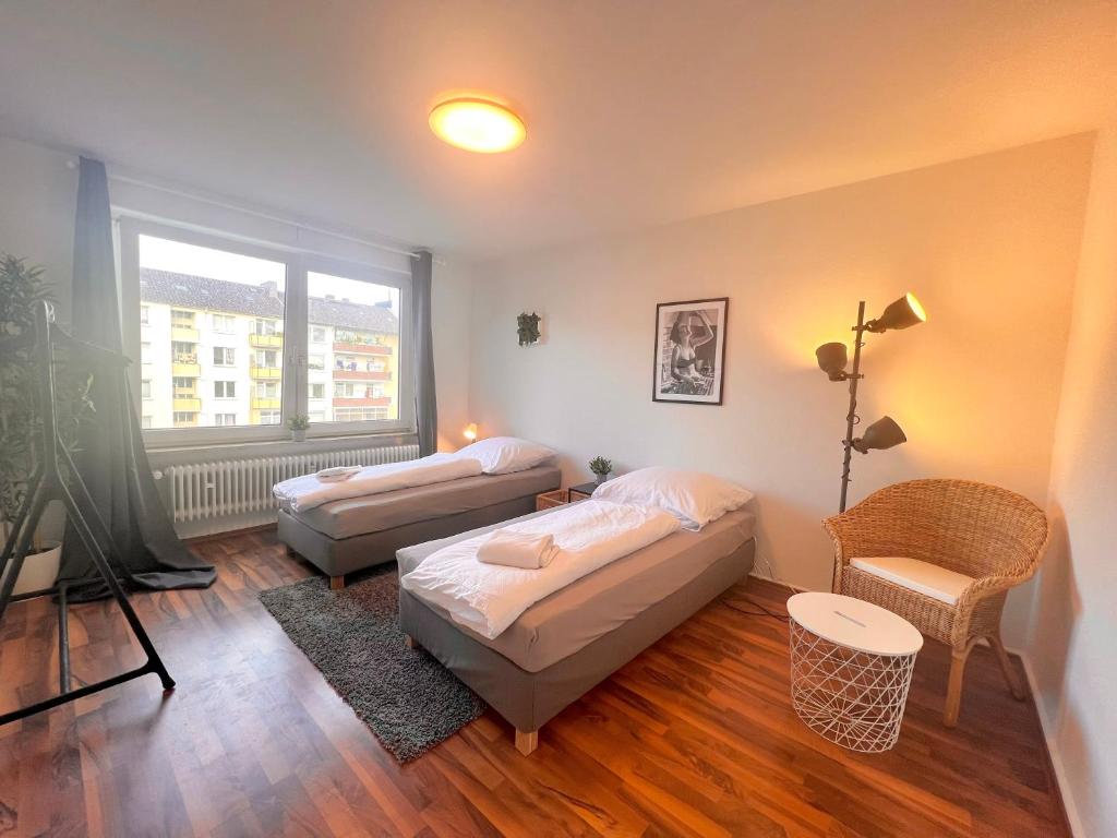 Postel nebo postele na pokoji v ubytování Zentrale Apartments im Herzen vom Bremerhaven