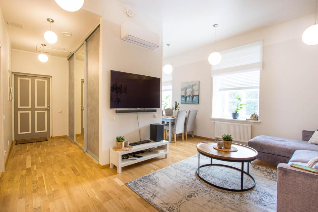 TV a/nebo společenská místnost v ubytování Lossi 32 Cozy Apartment