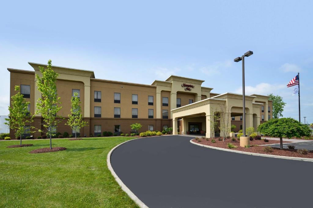 a rendering of the front of a hospital building at Hampton Inn Utica in Utica