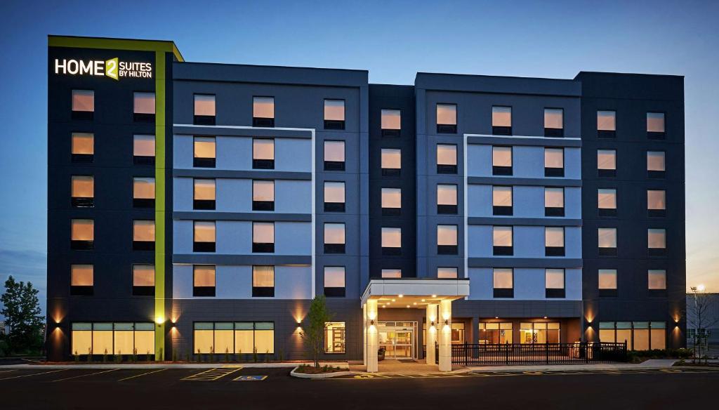 a large black building with a hotel at Home2 Suites By Hilton Brantford in Brantford