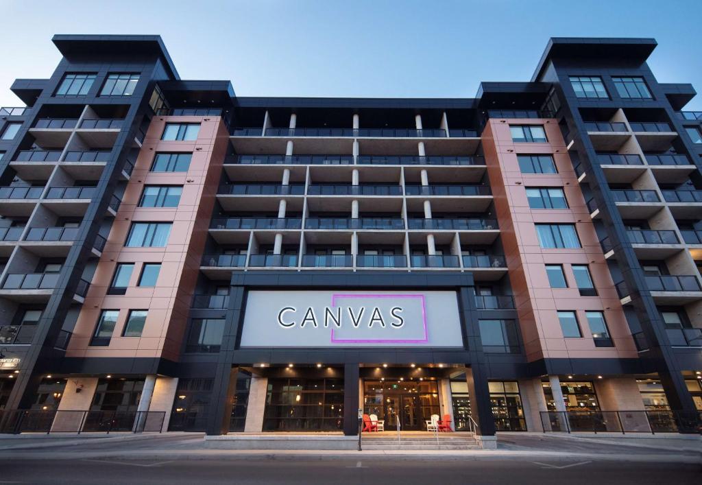 a building with a canvas sign in front of it at Canvas Moncton, Tapestry Collection By Hilton in Moncton