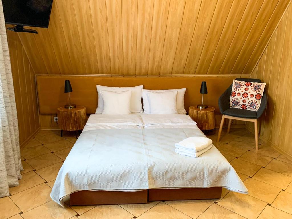 Posteľ alebo postele v izbe v ubytovaní APLIT GUEST HOUSE