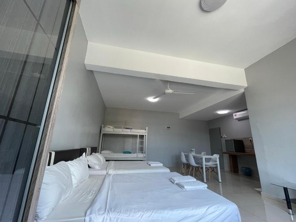 Postel nebo postele na pokoji v ubytování Reno Hotel Ipoh