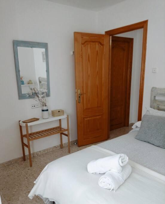 Postel nebo postele na pokoji v ubytování LabellaCasona