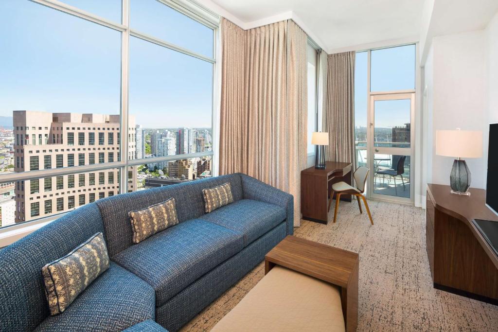 
King Suite with Balcony and City View
