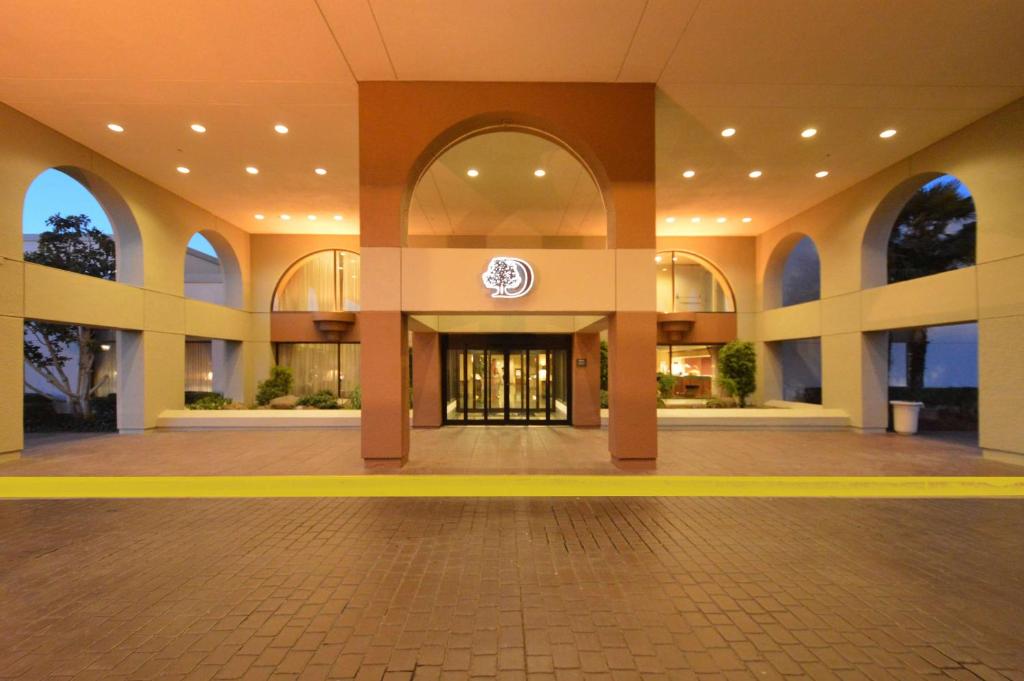 a large empty building with a lobby with a door at DoubleTree by Hilton Newark-Fremont in Newark