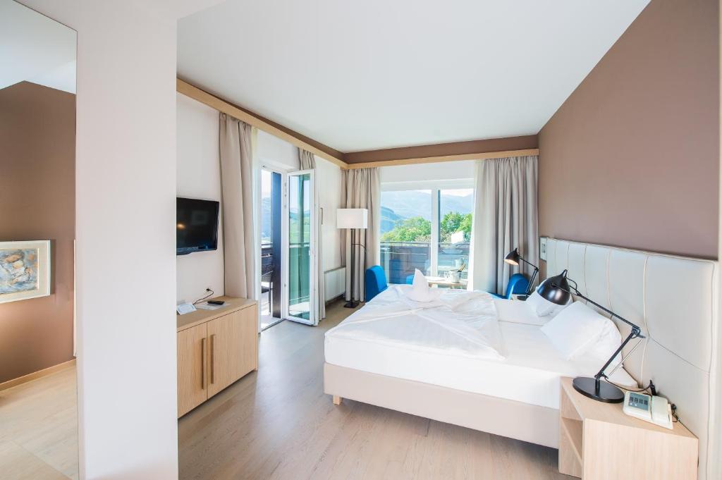 Postel nebo postele na pokoji v ubytování Seeberg Garni Hotel