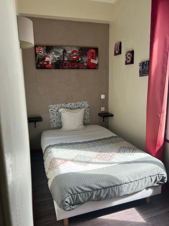Postel nebo postele na pokoji v ubytování Hôtel des 2 Gares