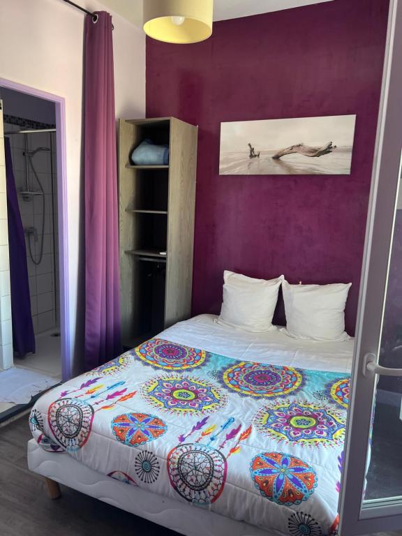 Postel nebo postele na pokoji v ubytování Hôtel des 2 Gares