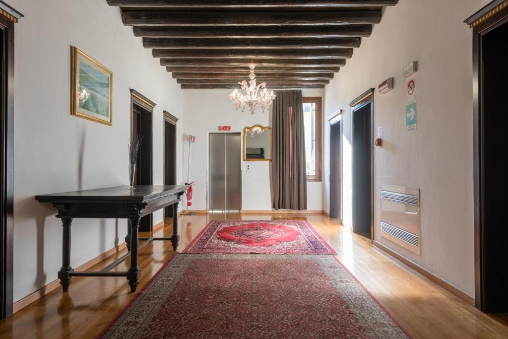 Postel nebo postele na pokoji v ubytování Hotel Trieste