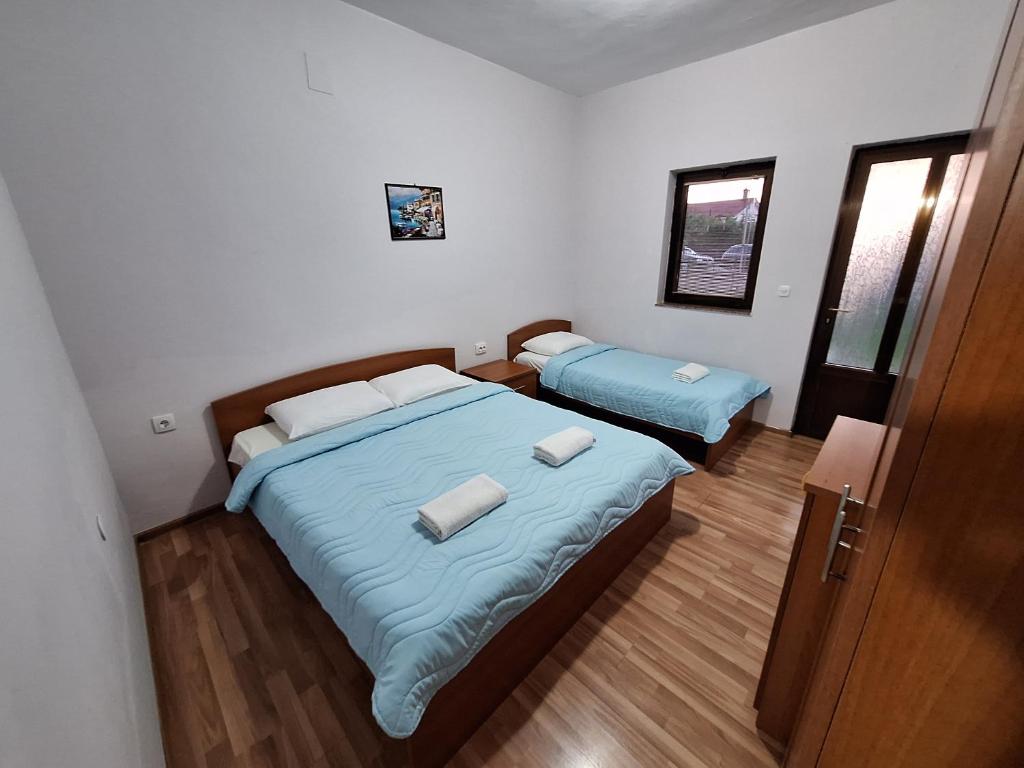 Postel nebo postele na pokoji v ubytování Studio Apartments Oleg Ohrid