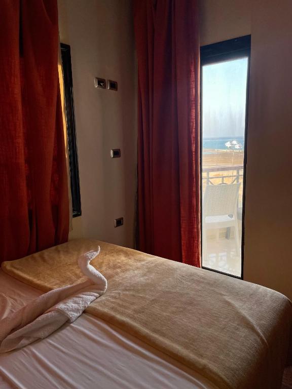 Voodi või voodid majutusasutuse sea view house toas