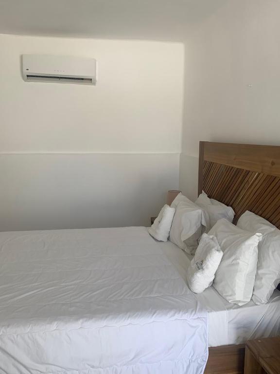 Postel nebo postele na pokoji v ubytování Hotel El Quemaito - Luxury Oceanfront Retreat
