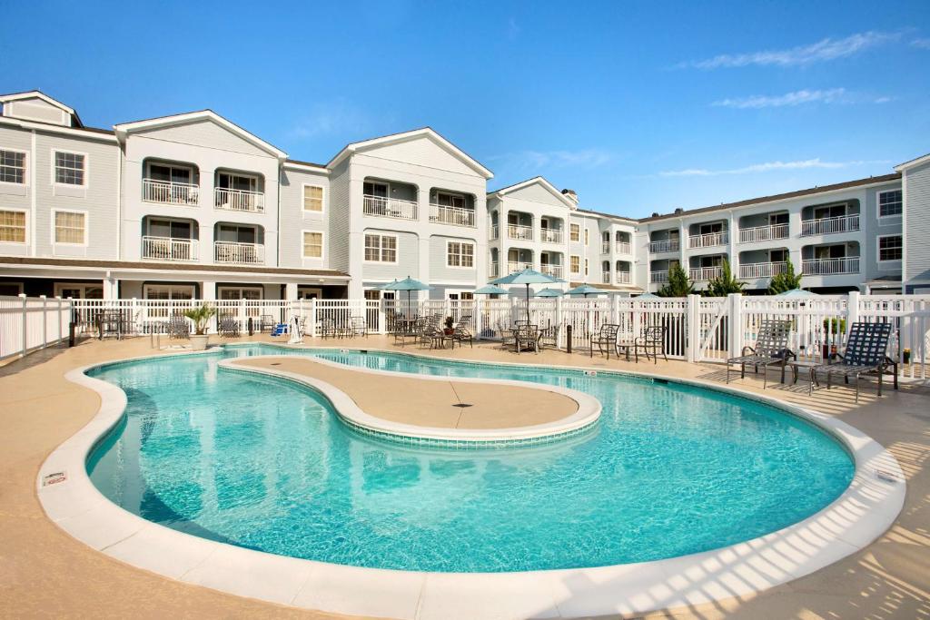 a large swimming pool in front of a building at Hampton Inn & Suites Outer Banks/Corolla in Corolla