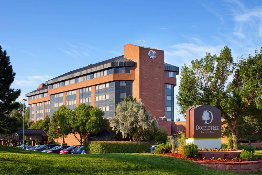 a building with a clock tower on top of it at DoubleTree by Hilton Denver/Westminister in Westminster