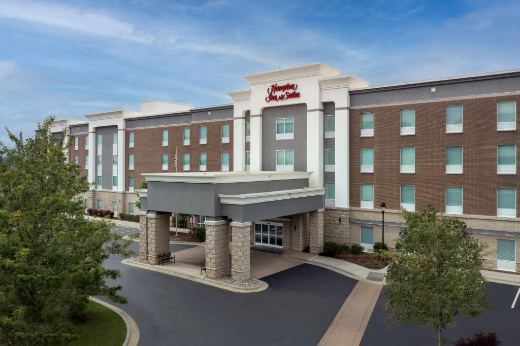 a rendering of the front of a hotel at Hampton Inn & Suites Holly Springs in Holly Springs