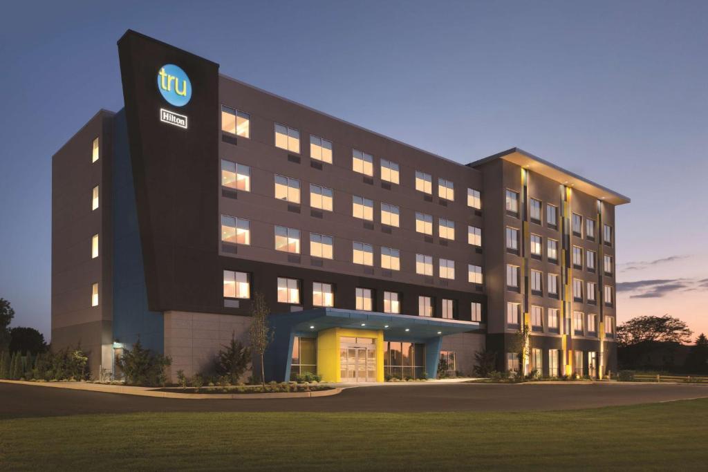 a building with a intel sign on the front of it at Tru By Hilton Lancaster East in Lancaster