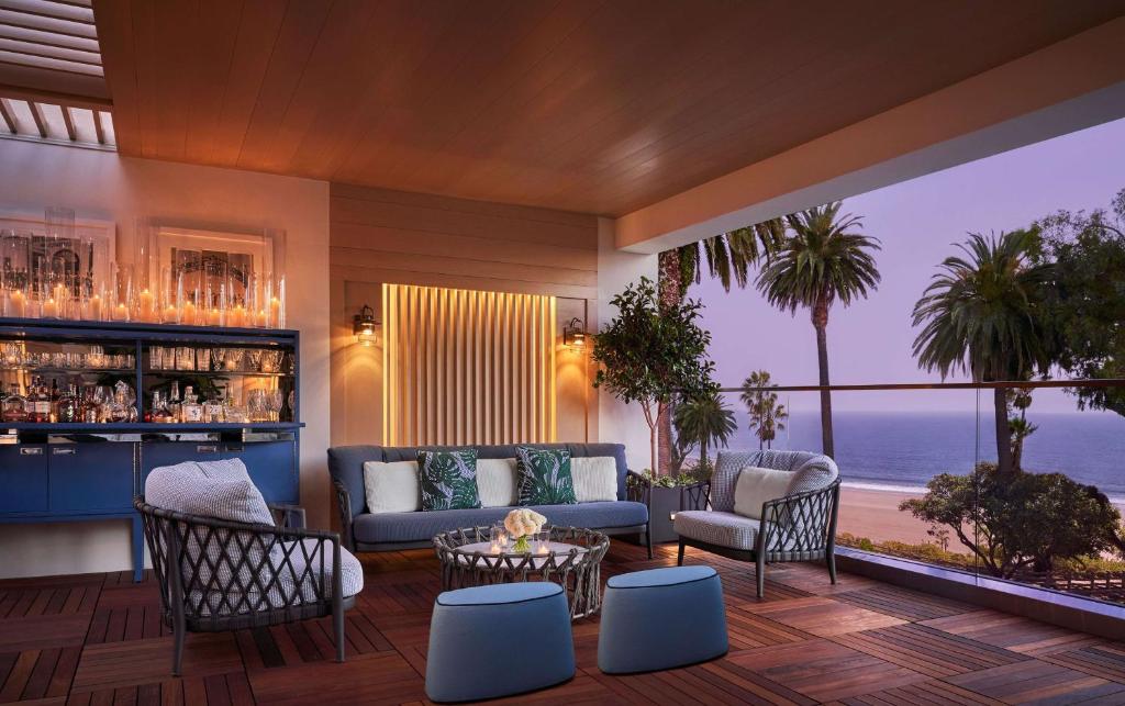 a living room with a view of the ocean at Oceana Santa Monica, LXR Hotels & Resorts in Los Angeles