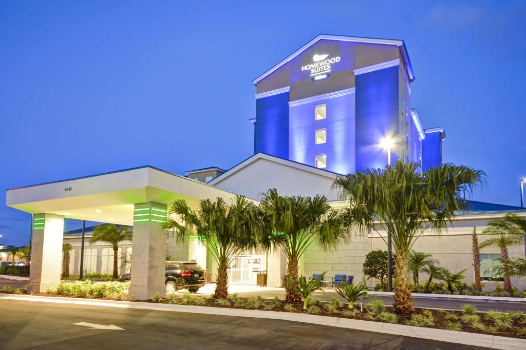 a rendering of the front of a hotel at Homewood Suites by Hilton Orlando Theme Parks in Orlando