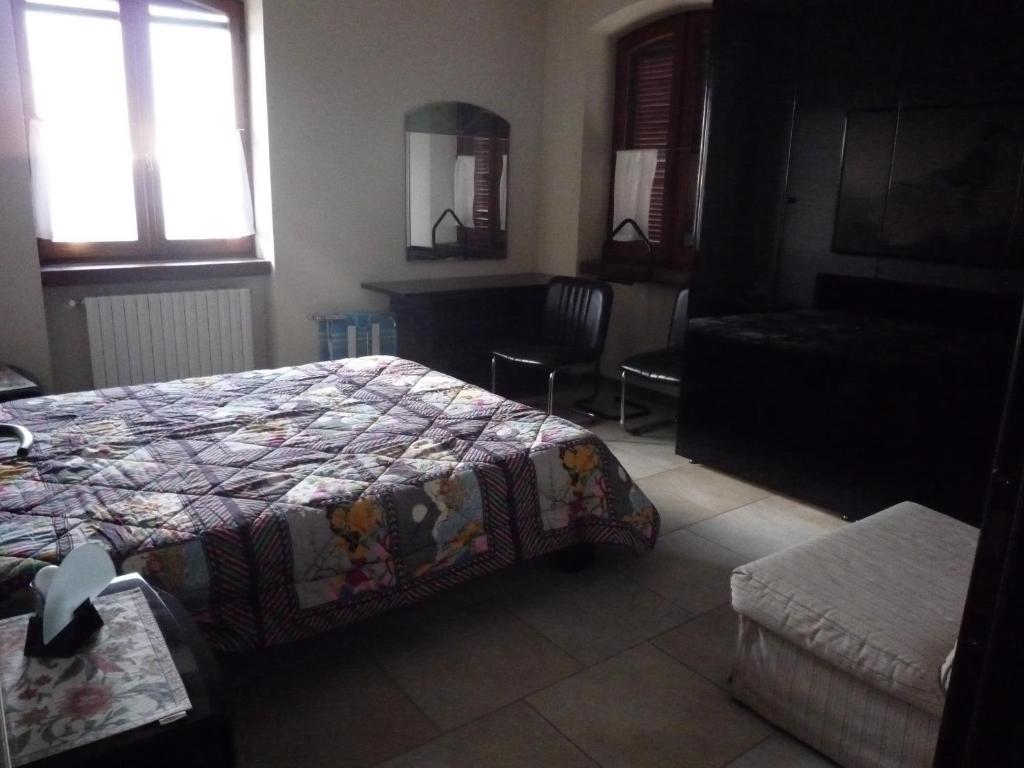 Posteľ alebo postele v izbe v ubytovaní La Vigna Del Parroco