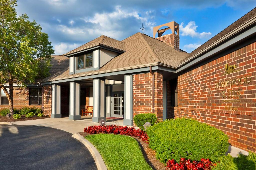 a brick house with a driveway at Homewood Suites Dayton-Fairborn in Fairborn
